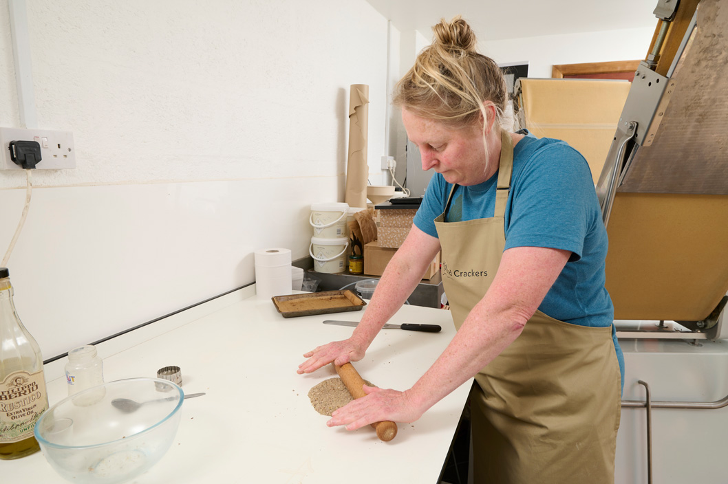 Donna Peacock rolling cracker dough