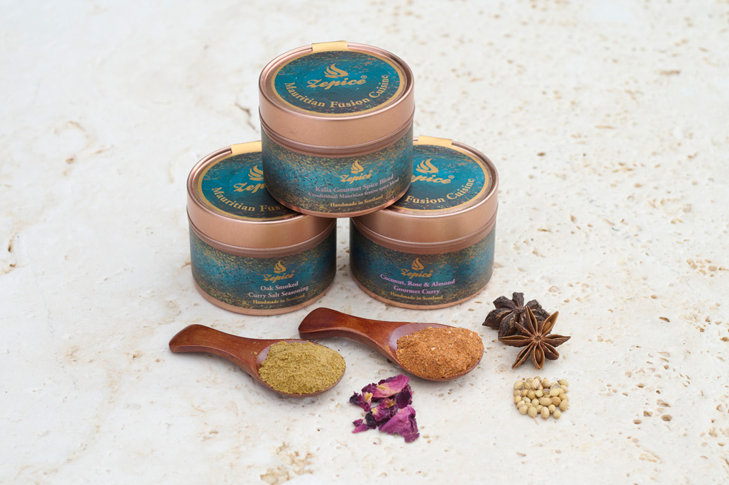 Three tins of spice blends