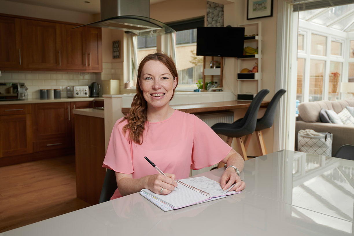 Karen Simpson from My Primary Tutor sitting at table